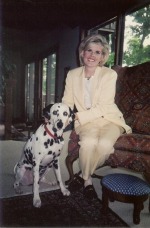 Laura Hart Burdick, pictured with her dog.