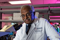 Dr. Mohanakumar at Norton Thoracic Institute Research Lab