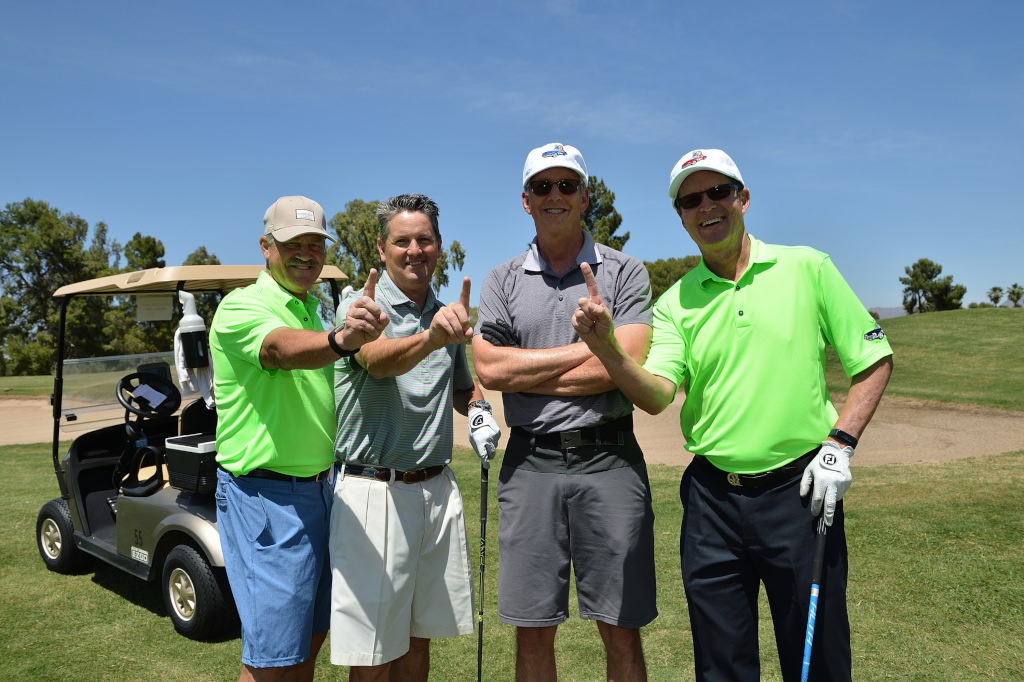 Golfers giving a thumbs up