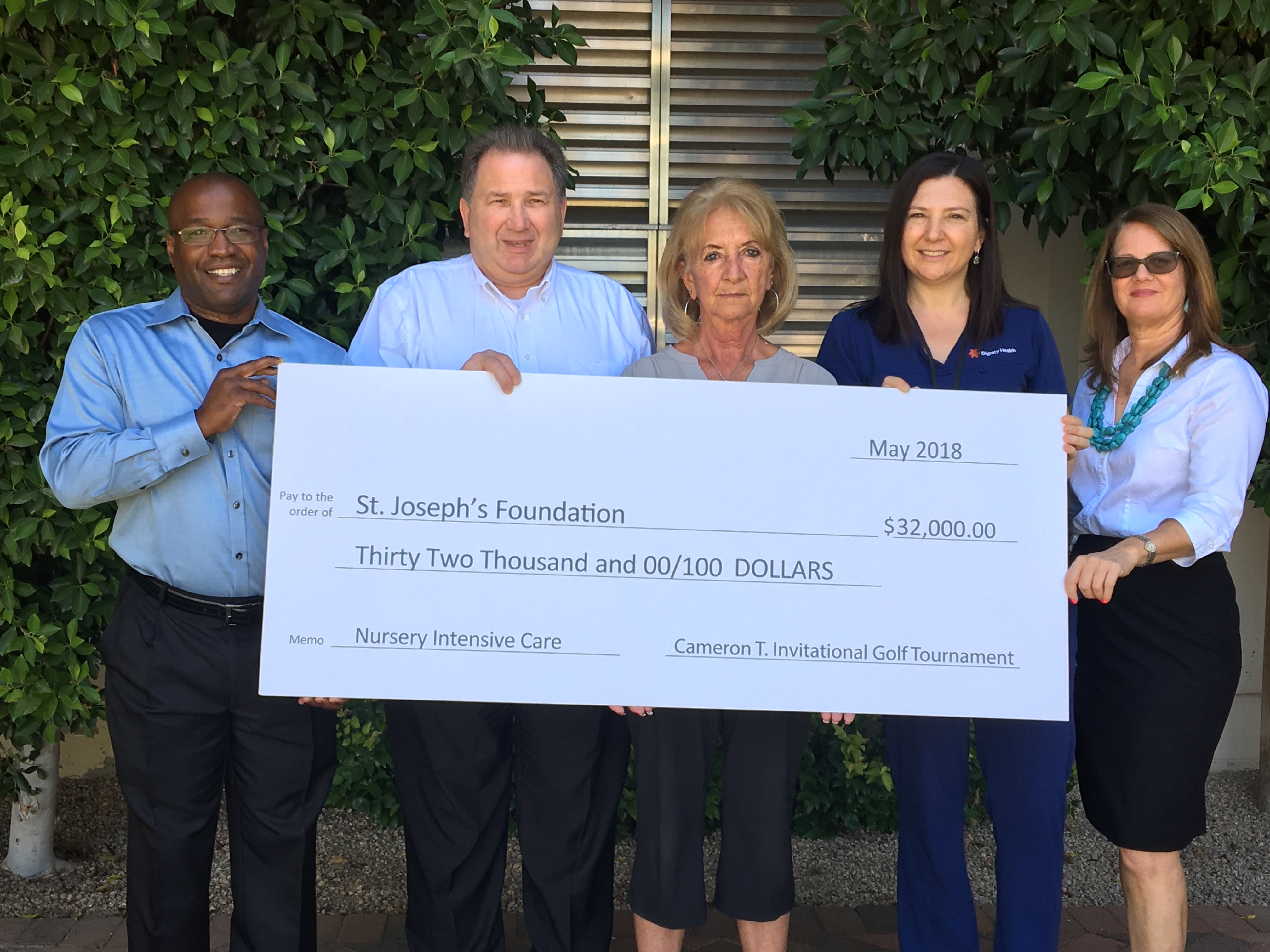Cameron's friends present check to St. Joseph's Foundation
