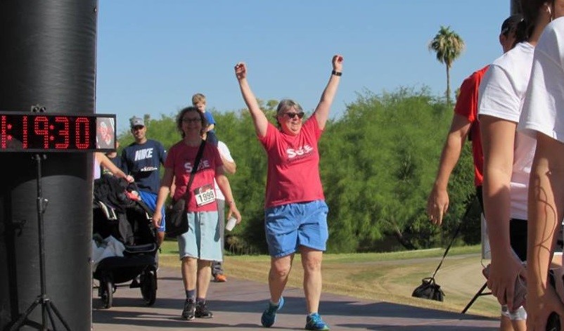 walker crossing finish line