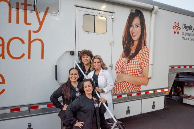 Four nurses standing in front of MOMobile