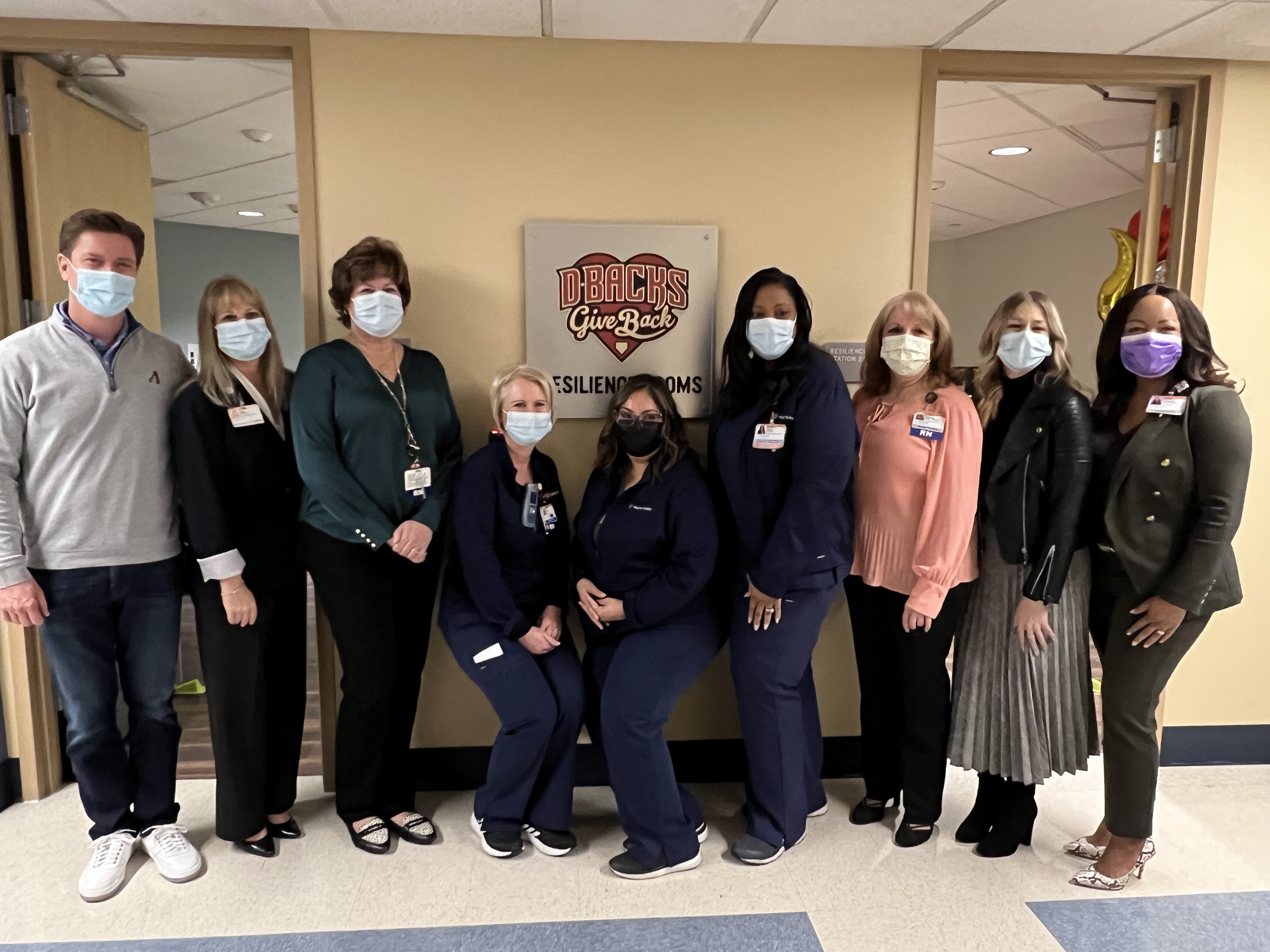 Hospital and Diamondback leaders outside of St. Joseph's nursing resilience rooms