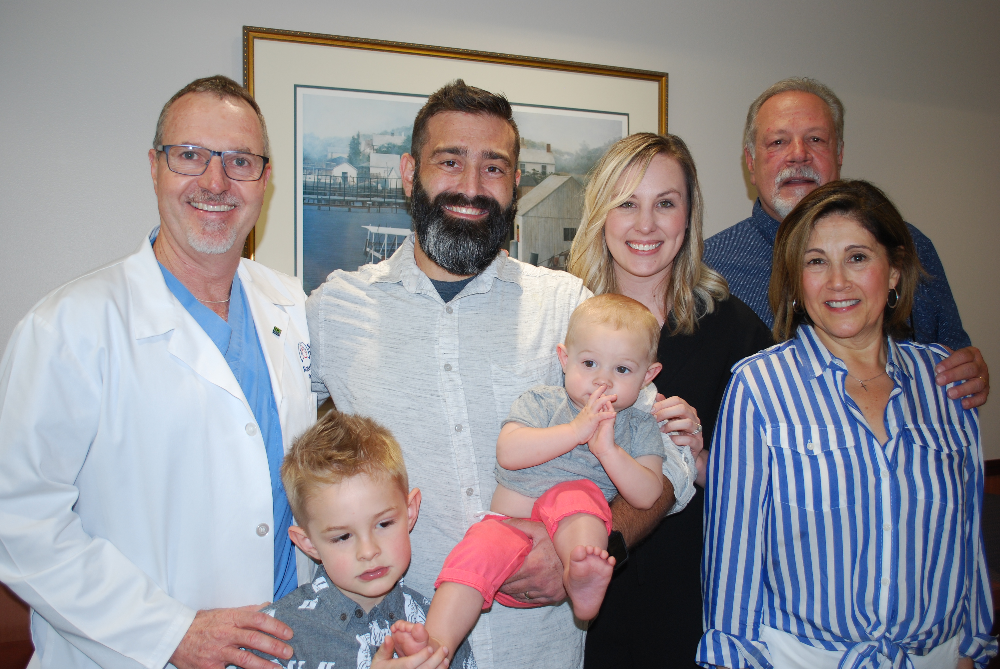 The Reuscher family and Dr. Ross Bremner